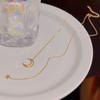 Moda nuevo collar de acero de titanio que no se decolora temperamento femenino oro de 18K ins viento frío estrella luna diseño de nicho colgante