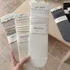 Calcetines de otoño 2026 para mujer, estilo coreano, de celebridad de internet, color liso, borde con volantes, algodón acanalado de doble aguja, calcetines de media pantorrilla, calcetines apilables