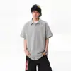 Camisa tipo polo de dos piezas falsas de alta resistencia estilo americano para hombre, diseño de verano, elegante camiseta con cuello camisero, top de manga corta de alta resistencia