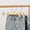 Perchero para pantalones con pinzas, colgador de pantalones antideslizante para uso doméstico, perchero ajustable con pinzas, impresión de logotipo, venta al por mayor de fábrica