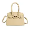 Bolso de Mano de Gran Capacidad de Moda Estilo Coreano para Mujer 2026 Nuevo Modelo Textura Simple Bolso Kelly Diseño de Nicho Bolso Cruzado