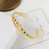 Pulseira de camada dupla de luxo leve da moda transfronteiriça, pulseira de trevo de quatro folhas com zircônio incrustado de cobre, pulseira popular na Amazon para mulheres, atacado