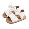 Sandálias novas de verão 2025 com laço de PU para bebês meninas, cor sólida, sapatos coreanos fofos para bebês