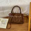 Moda Primavera 2026 Bolsa de Mão Retrô Simples e Estilosa Bolsa Saco Versátil para o Trabalho e Uso Diário Bolsa de Ombro Transversal para Mulheres