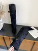 Bota versátil de tacón alto con cuña de gamuza de pierna ancha estilo europeo y americano
