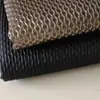 Nuevo directo de fábrica hilo teñido oro estampado en relieve punto ropa al por mayor jacquard Funda de almohada sofá traje tela para vestido