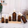 Em estoque Frosted Brown garrafa de óleo essencial conta-gotas garrafa sub-garrafa essência garrafa líquida madeira grão círculo de transferência de água impressão 30ml garrafa de sopro