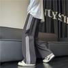 Pantalones rectos holgados de estilo americano para hombre, pantalón ancho informal a rayas de colores a la moda, combinables con todo, otoño de 2024