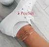 Popular tobillera de lentejuelas transfronteriza en Europa y Estados Unidos Amazon moda de verano flecha diamante adornos para el pie de tres piezas