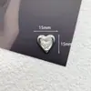 Joyería Sencilla de Aleación con Incrustaciones de Diamantes K Blanca Accesorios de Lazo de Amor Pendientes de Temperamento Accesorios para el Cabello Funda para Teléfono Móvil Material de Bricolaje