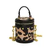 Bolsa Infantil Otoño e Invierno Nueva Mini Bolsa Cubo de la Fortuna Estampado Retro Bolso Cruzado con Cadena para Niñas Bolsita para Labial