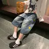 Calça Capri Jeans Estampada com Estrelas Retrô para Mulheres, Novo Estilo Verão 2026, Caimento Solto, Emagrecedor, Azul Graffiti, Estilo de Rua