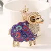 Novo chaveiro de ovelha com detalhes em strass e design de gota de óleo, design do signo de ovelha do zodíaco chinês, pingente para bolsa feminina, chaveiro de carro, pequeno presente