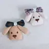 26 Estilos Nuevos de Accesorios para Pasadores de Pelo, Broches, Bolsas, Ropa, Sombreros, Zapatos, Calcetines y Accesorios de Vestimenta con Relleno de Algodón en Forma de Cachorro y Moño