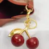Artículo Popular Transfronterizo: Llavero de Cerezas Frescas y Sencillas, Colgante de Cerezas Multicolor, Accesorio de Bolso de Moda, Directo de la Fábrica Fuente