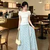 Vestido coreano de línea A con cola de pez para mujer, nueva colección de verano, conjunto de camiseta asimétrica sin hombros con estampado floral y falda