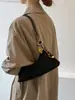 Bolsa de ombro de alta qualidade e estilosa para mulheres, nova coleção outono/inverno 2025, versátil para o trabalho e o trajeto, bolsa crossbody com design semelhante a um bolinho
