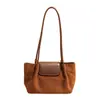 Elegante bolsa de mano estilo francés otoño 2026 de gran capacidad, bolso de hombro de nicho, alta moda, elegante, bolsa ligera para debajo del brazo
