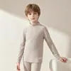 Conjunto de ropa interior térmica para niños, que incluye capas base térmicas de seda y lana, camisetas interiores de cuello alto y pantalones térmicos engrosados, tanto para niños como para niñas.
