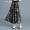 Falda de retazos a cuadros reversible para mujer, nueva falda de cintura alta con corte en A adelgazante para otoño/invierno 2026, falda elegante y versátil