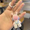 Llavero con forma de conejo espacial rojo de red, colgante para mochila de estudiante, bonito y exquisito colgante para estudiantes de jardín de infantes, pequeño regalo al por mayor