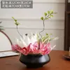 Mesa de centro floral simulada de lujo de alta gama, mesa de comedor para sala de estar, adornos de flores artificiales, jarrón geométrico creativo, decoración de hotel, arreglo floral