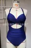 Europa e Estados Unidos novo maiô de peça única combinação de cores sexy alça cruzada vazada maiô feminino Amazon cross-border spot atacado