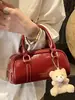 2026 Nuevo Modelo Bolso de Hombro Texturizado de Color Sólido de Moda Elegante para Mujer Bolso Boston de Moda Bolso Cruzado de Moda