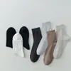 Calcetines para Hombre Primavera y Verano Nuevos Calcetines para Hombre Color Sólido Transpirables de Negocios de Media Pantorrilla Malla Calcetines Casuales para Hombre Versátiles para Todas las Estaciones