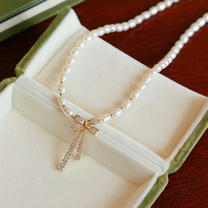 蝴蝶结吊坠天然淡水珍珠项链轻奢小众高级感镶钻小米珠