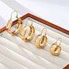Pendientes de acero inoxidable chapados en oro de 18k de arco ancho transfronterizos Europa y Estados Unidos textura de lámina delgada joyería de oreja simple cierre de oreja de círculo en forma de U