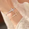 Pulseira de Cruz com Zircônia Estilo Minimalista com Toque de Luxo, Pulseira de Nicho de Luxo Leve, Joia de Mão Exquisita e Elegante Atacado