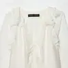 Venta al por mayor transfronteriza Primavera 2026 Nueva moda para mujer Estilo europeo y americano Camisa de manga larga decorativa plisada en capas para mujer en blanco