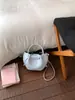 Bolso de Mujer de Gama Alta 2026 Nuevo de Moda Primavera Super Popular Pequeño Bolso Tote para el Trabajo Bolso Cruzado de Hombro Único Bolso Cubo