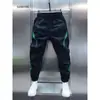 Pantalones Deportivos Casuales Versátiles Cómodos de Secado Rápido Finos de Verano Moda Tendencia Estilo Hong Kong Parcheado Bloqueo de Color Textura Pantalones con Cordón