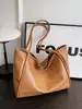 Bolsa de ombro para comércio exterior transfronteiriço para mulheres, novo modelo 2026, cor sólida, bolsa tote de grande capacidade, bolsa de trabalho estilosa e texturizada