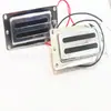 Accesorios para guitarra pastilla de guitarra pastilla nueva forma de dos agujeros de gama alta Pastilla Plateado