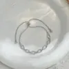 Pulseira de Mão com Zircônia Microincrustada Banhada a Ouro Real, Joia Leve de Luxo para Mulheres, Sensação de Alto Padrão, Geométrico Oval, Ajustável com Fio de Puxar, Atacado