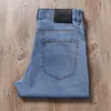 Jeans Masculino Azul Sarja Elástica Ultra-Fino Macio Respirável Tencel Verão 2026 Cintura Média Corte Reto para Negócios