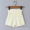 Otoño Europeo y Americano Nuevo Conjunto de Atmósfera Francesa Suave de Principios de Otoño Top de Punto con Cuello de Una Línea Retorcido Conjunto de Shorts
