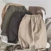 Pantalones Nuevos para Niños Estilo Coreano Infantiles de Otoño Versátiles de Moda Casual con Costuras Color Sólido de Moda de Otoño Sueltos Largos