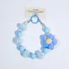 Nova versão coreana do pingente de bola de pelúcia para outono e inverno, pingente de celular com contas feito à mão, pulseira curta, corrente anti-perda, feminina