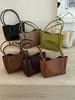 Bolsa de palha tecida com design de nicho estilo coreano, nova tendência de verão 2026 e bolsa de ombro única e fashion de grande capacidade