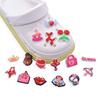 Dibujos animados lindo personaje de dibujos animados PVC goma suave zapatos con agujeros flor hebilla de zapato pulsera con accesorios para zapatos de jardín en stock venta al por mayor