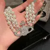 Collar de Emperatriz Viuda Perlas Bolas Saturno Tres Capas Trabajo Pesado Gargantilla Clavícula Collares de Diamantes Brillantes Collar Dulce Versátil