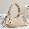 Bolso de mano tipo bolsa de dumplings nuevo y elegante de alta apariencia, bolso de hombro o axila versión coreana, bolso cruzado para mujer, bolso para mujer