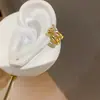 Estilo Ins Coreano Zirconia Doble Capa Estampado Mango Estrella Clip para Hélice de Oreja Ligero Lujo Sensación de Gama Alta Sin Perforación Pendientes de Clip de Hueso de Oreja de Moda