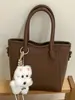 Bolso de Alto Valor Estético para Mujer 2026 Primavera Nueva Moda Elegante Bolso de Hombro Cruzado Bolso Cubo Retro para Commuter