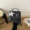 Mochila niche estilo coreano com estampa de estrelas para mulheres, bolsa de mão da moda 2026, mini mochila casual para o dia a dia