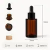 Botella de aceite esencial de 30 ml en stock, botella con gotero para sérum de cuidado de la piel, botella de vidrio para dispensar líquidos, botella con gotero para aceite esencial, botella dispensadora